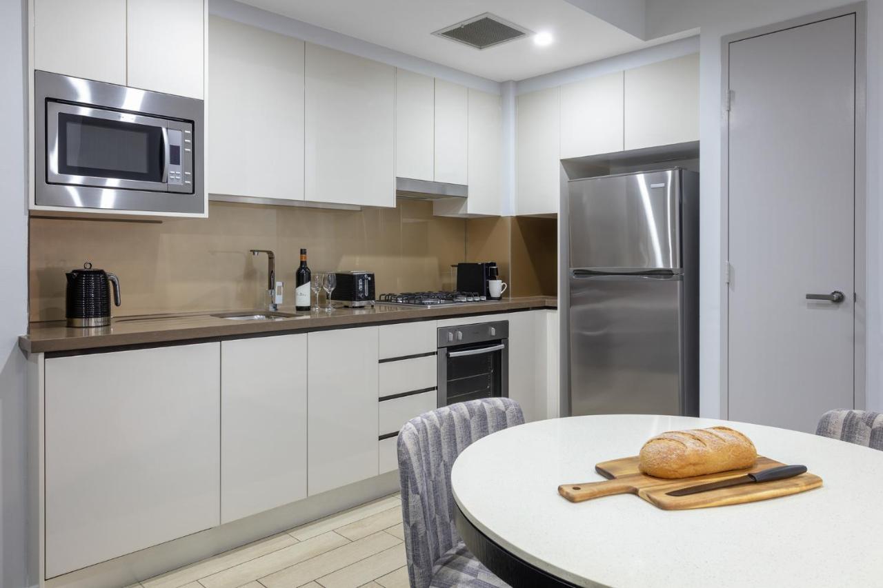 Meriton Suites North Ryde Cité de Cité de Sydney Extérieur photo A typical kitchen in a residential apartment