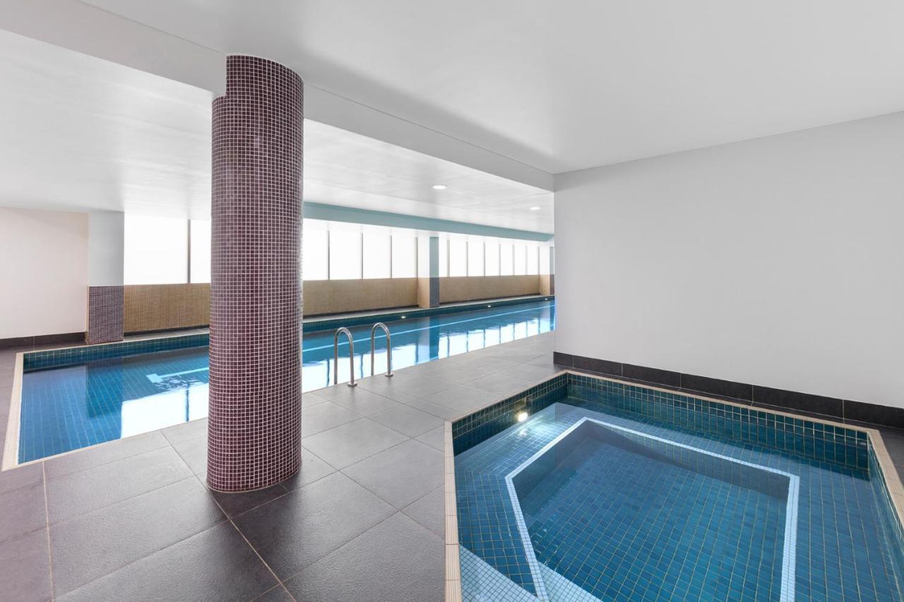 Meriton Suites North Ryde Cité de Cité de Sydney Extérieur photo The swimming pool at the hotel
