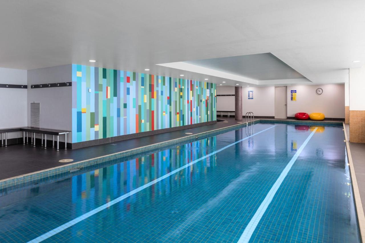 Meriton Suites North Ryde Cité de Cité de Sydney Extérieur photo The swimming pool at the hotel