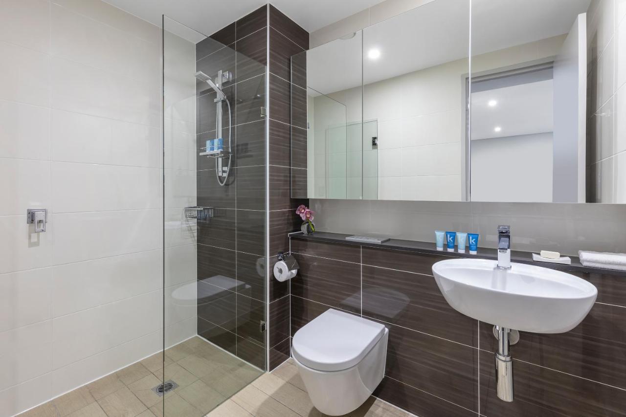 Meriton Suites North Ryde Cité de Cité de Sydney Extérieur photo A modern bathroom