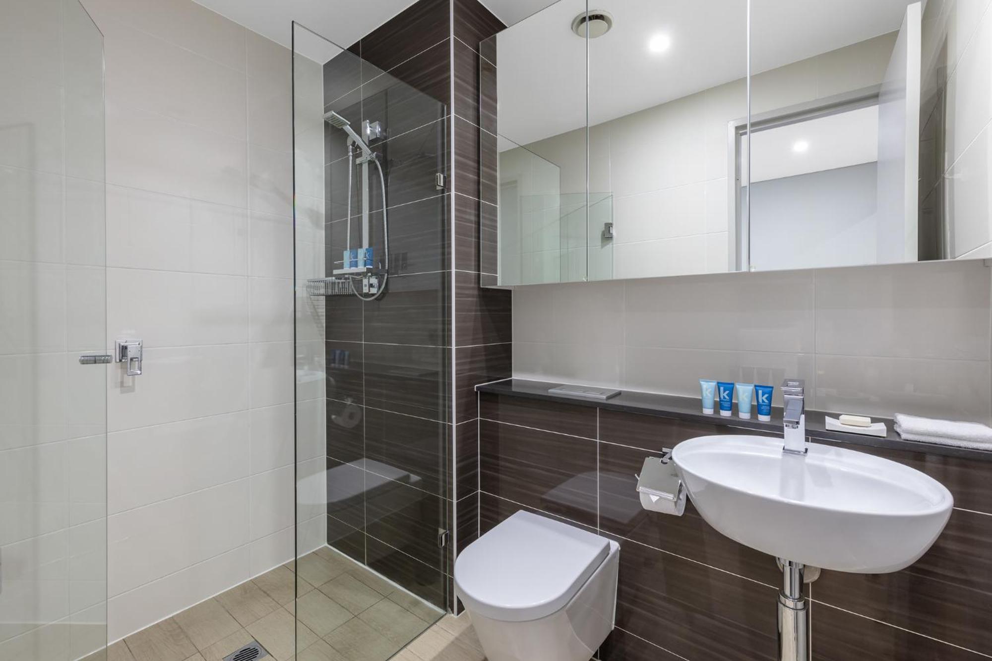 Meriton Suites North Ryde Cité de Cité de Sydney Extérieur photo A modern bathroom